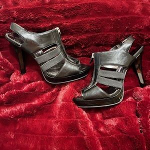 Black open toe shoes.